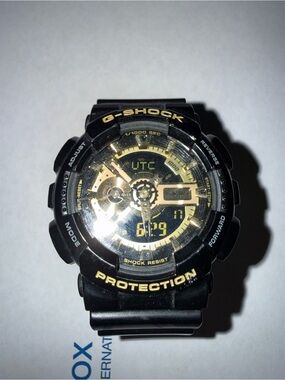 G-Shock Black and Gold Analog-Digital Sport Watch